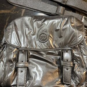 Tory Burch Silver crossbody puff bag.